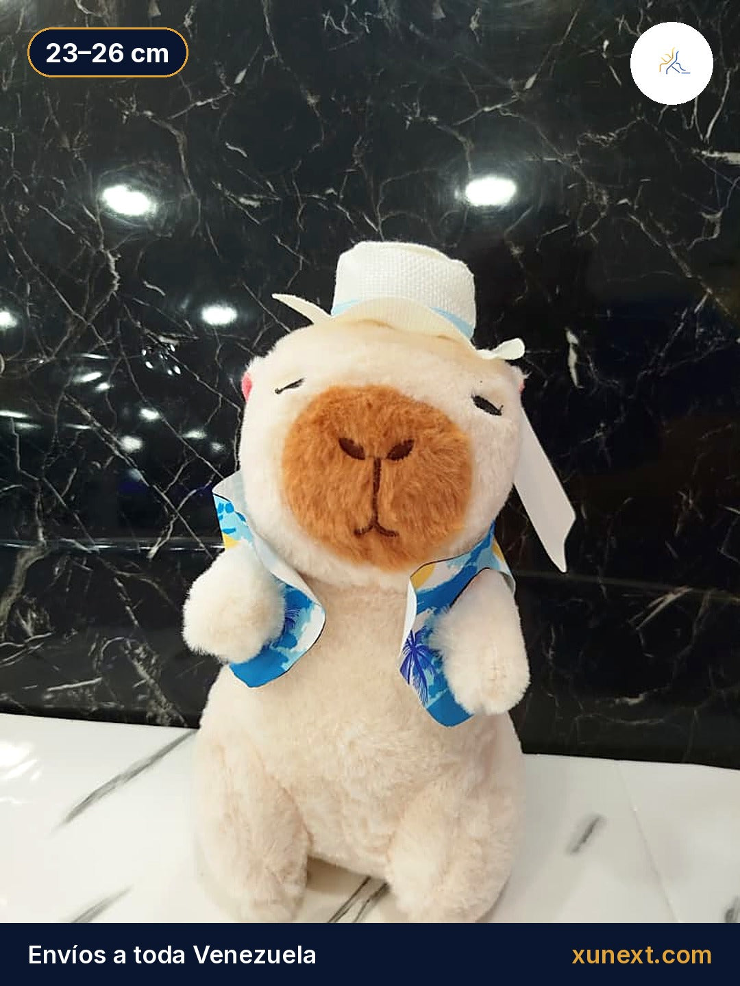 Peluche de chigüire (capibara) con gorrito y pañuelo, 23 a 26 cm